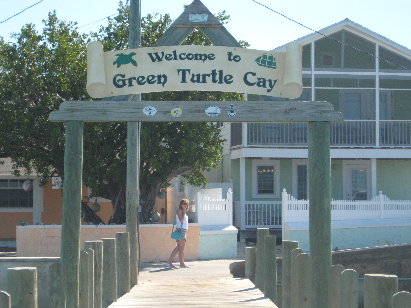 The Welcoming Sign at the Dinghy Dock, New Plymouth is the name of the settlement at Green Turtle.