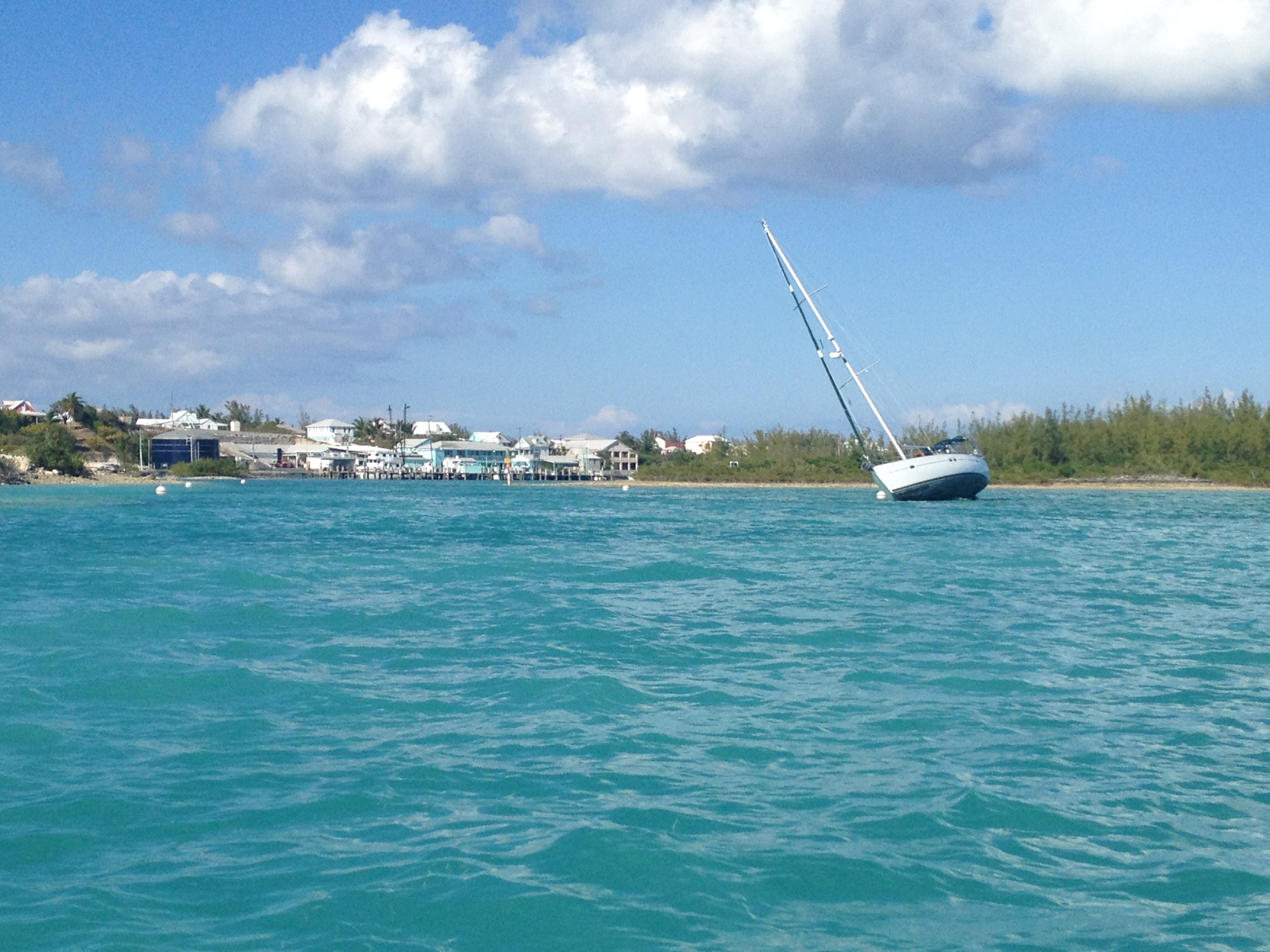 Sailing vessel Fancy Free aground at the entrance to Spanish Wells