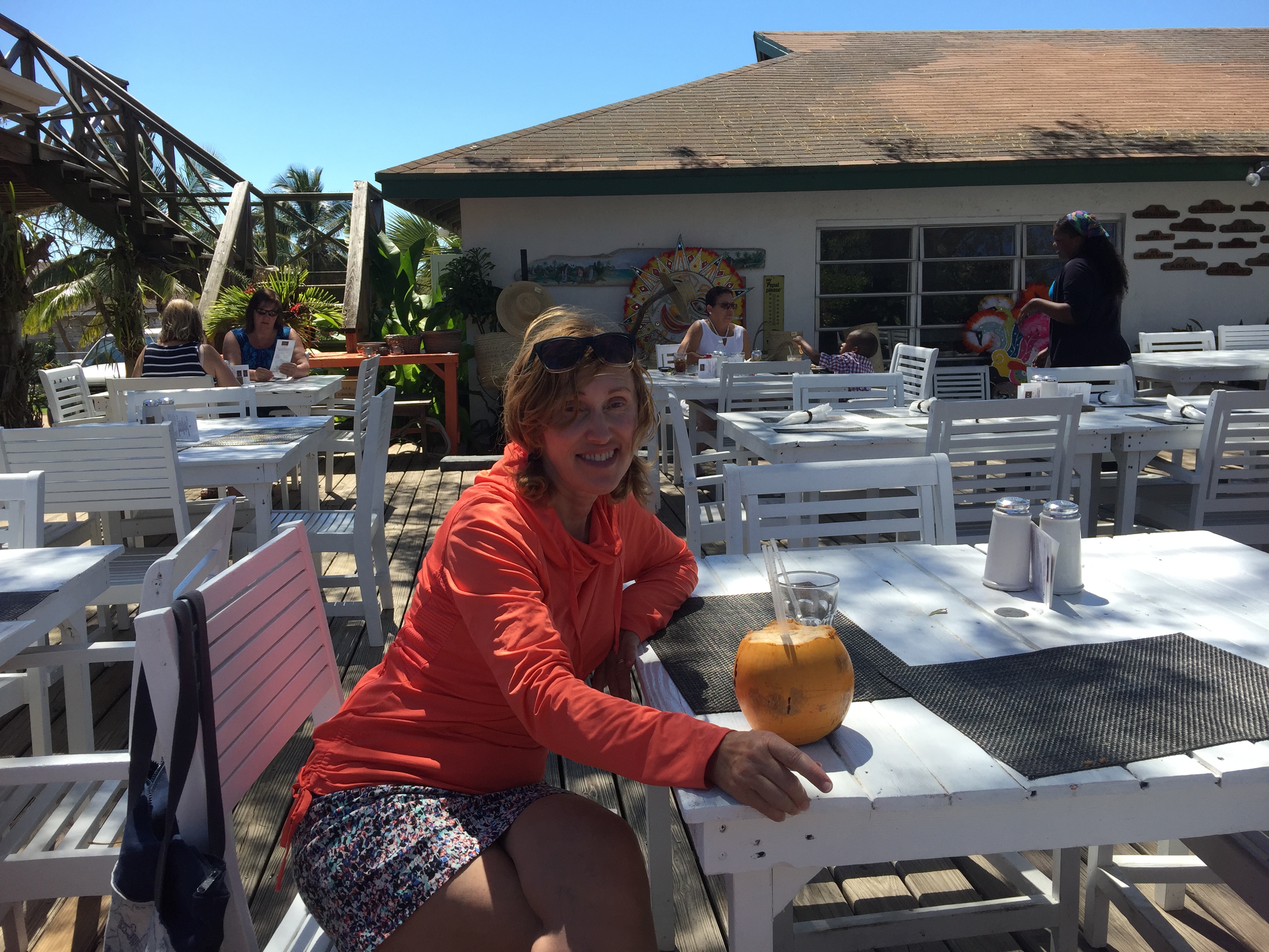 Elena enjoying a cocunut rum drink at the Buccaneer Club, the our favorite restraurant in Eleuthera.